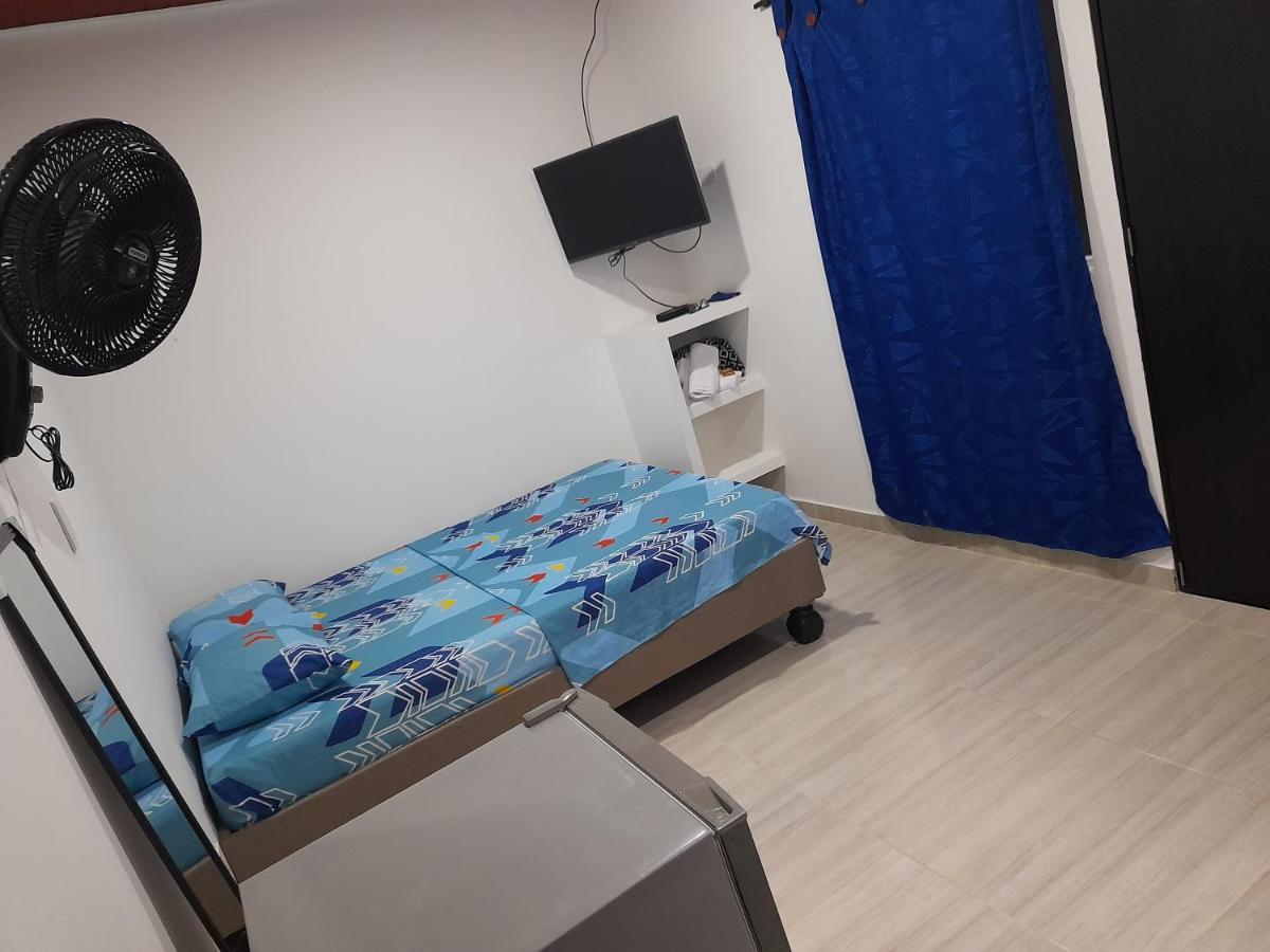 Apartaestudios El Jardin Cali Bilik gambar