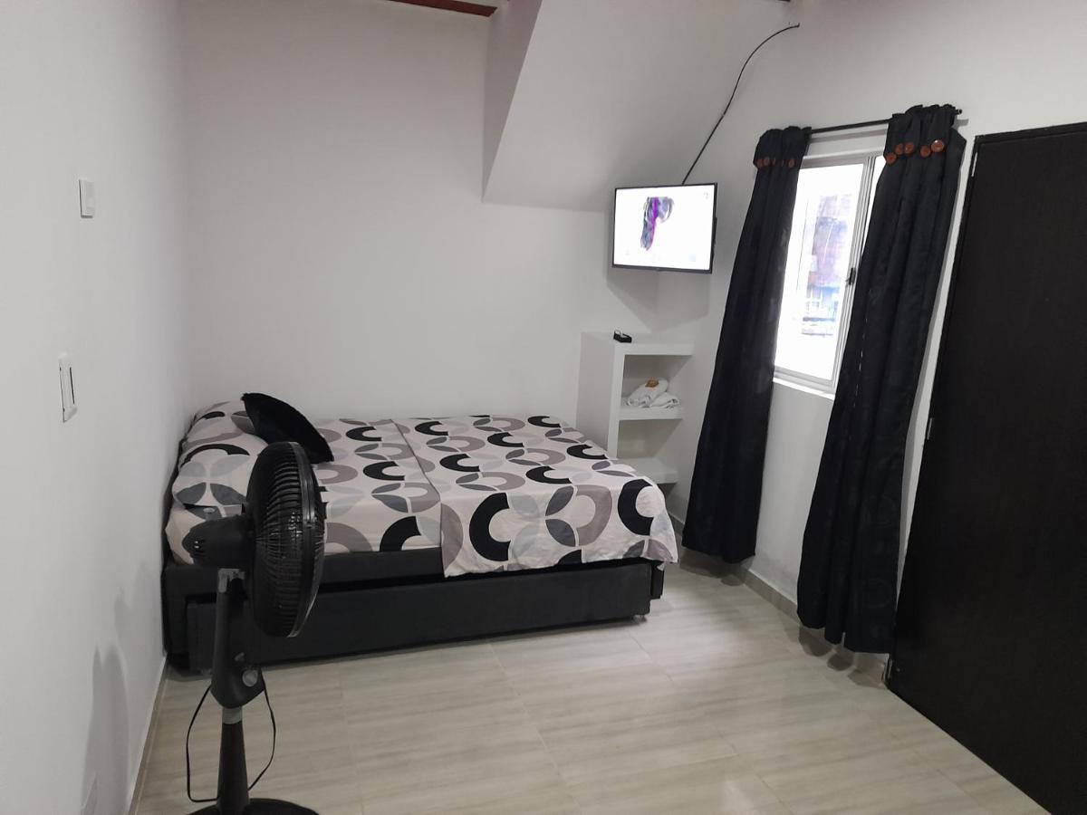 Apartaestudios El Jardin Cali Bilik gambar