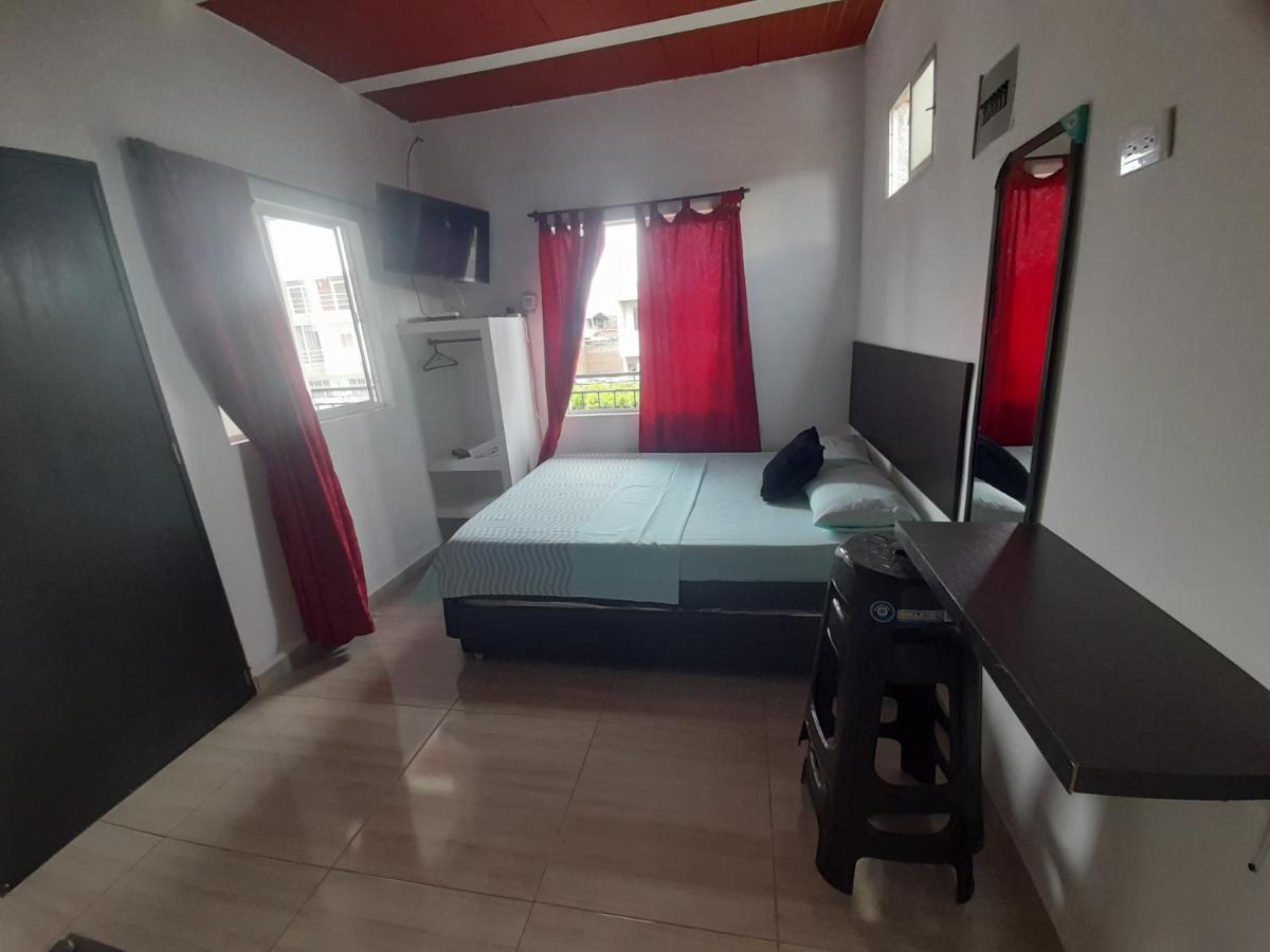 Apartaestudios El Jardin Cali Bilik gambar